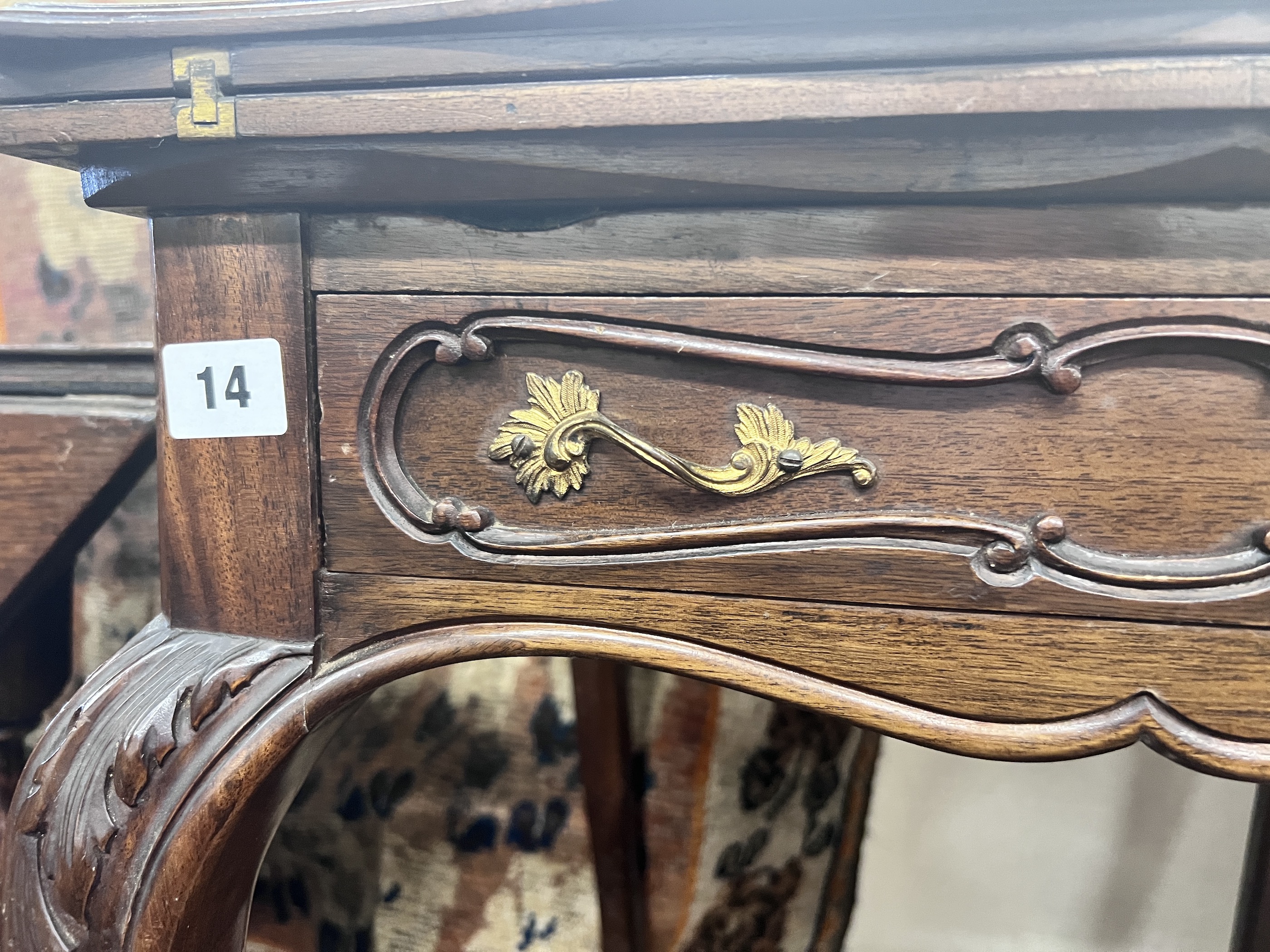 A late Victorian mahogany envelope card table, width 51cm, depth 51cm, height 75cm